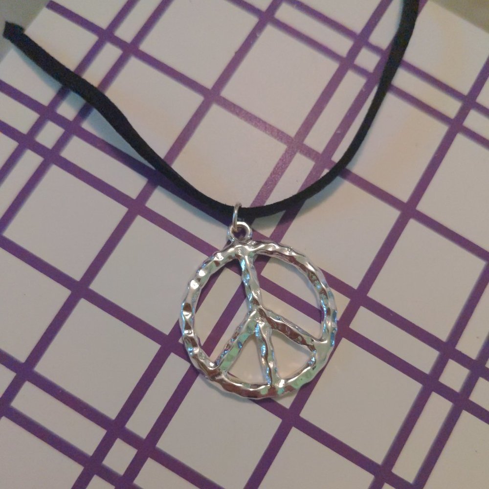 Hammered metal peace sign necklace
